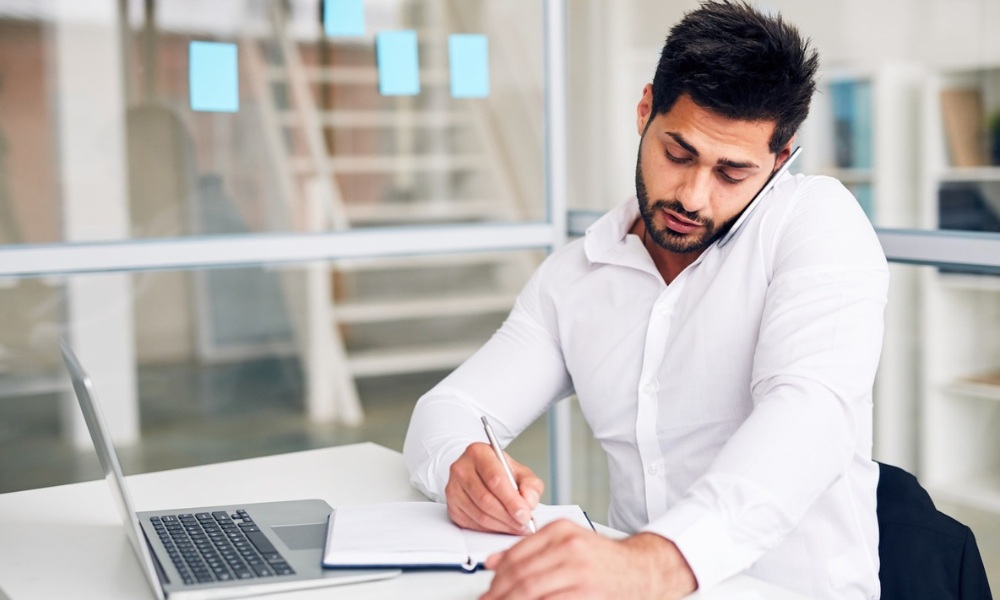 Small business owner reviewing an online presence checklist